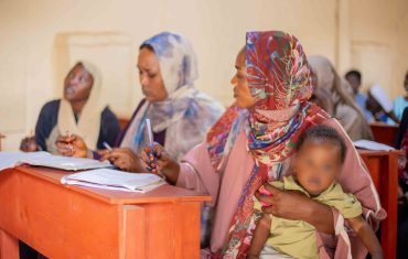 English Language learner with a child